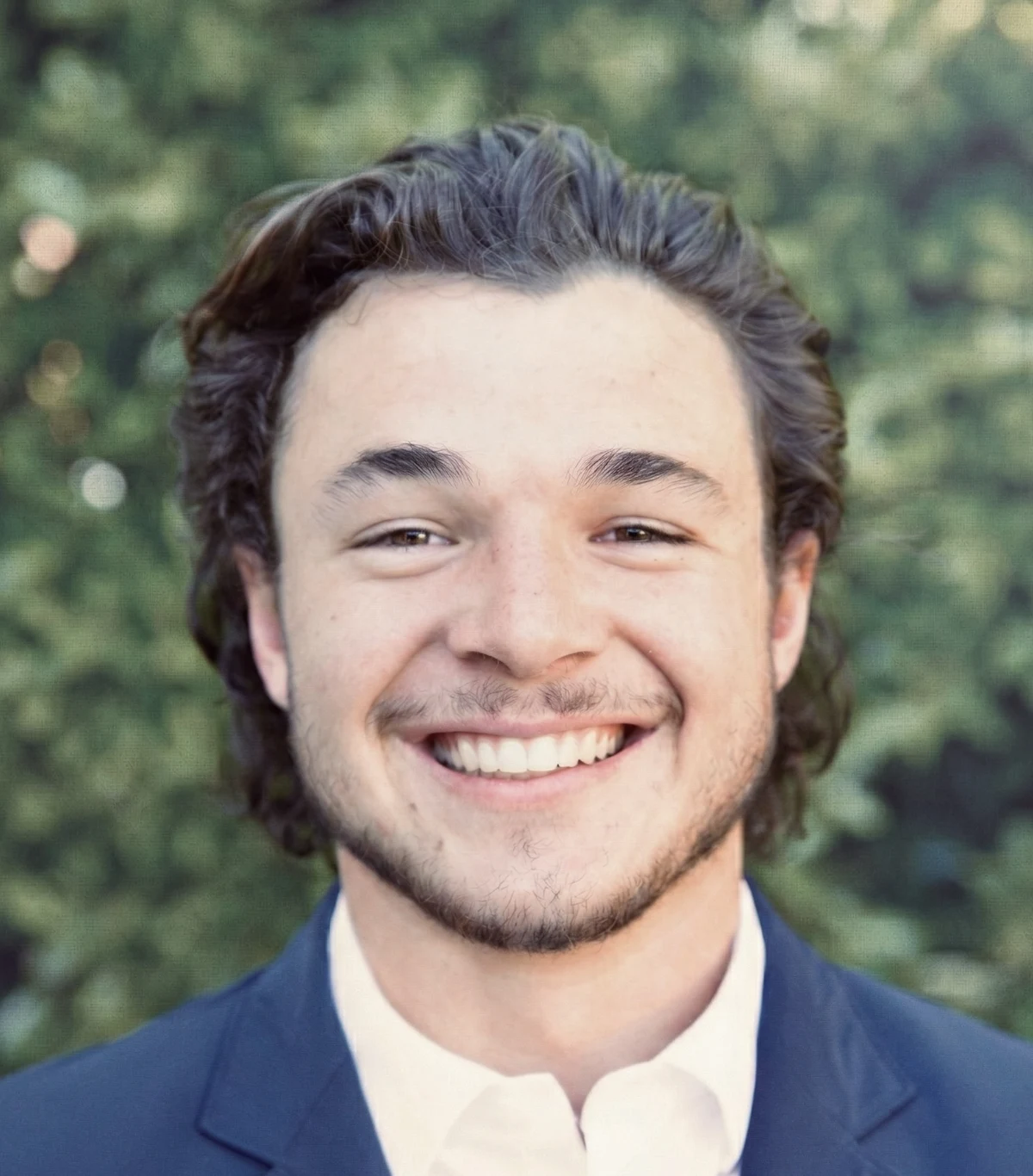 Portrait of Alec Raymond